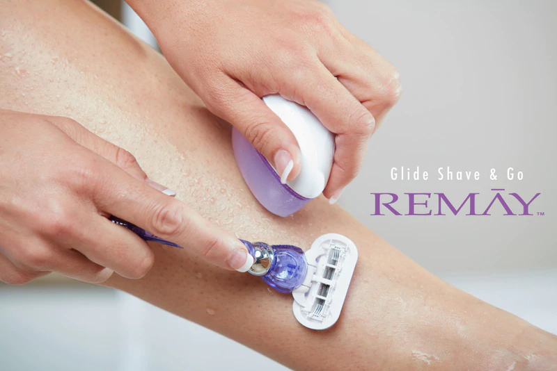 Woman using  Remay Shave Gel Bar on her legs to simplify her shaving routine!