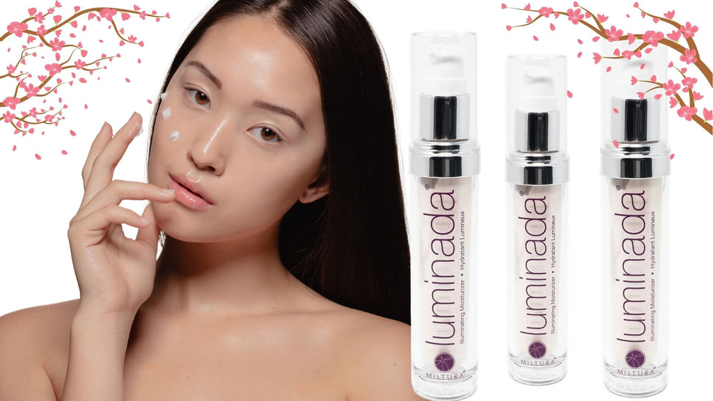 Woman applying Luminada lluminating Moisturizer infused with grapeseed oil extract and algae extract